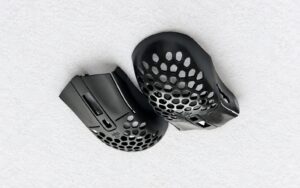 Lightweight honeycomb gaming mouse housing injection moulded components