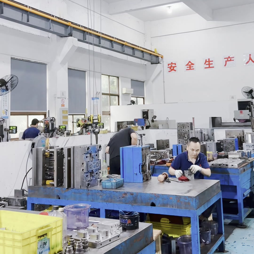 JingZhan tooling technicians assembling and maintaining injection moulds