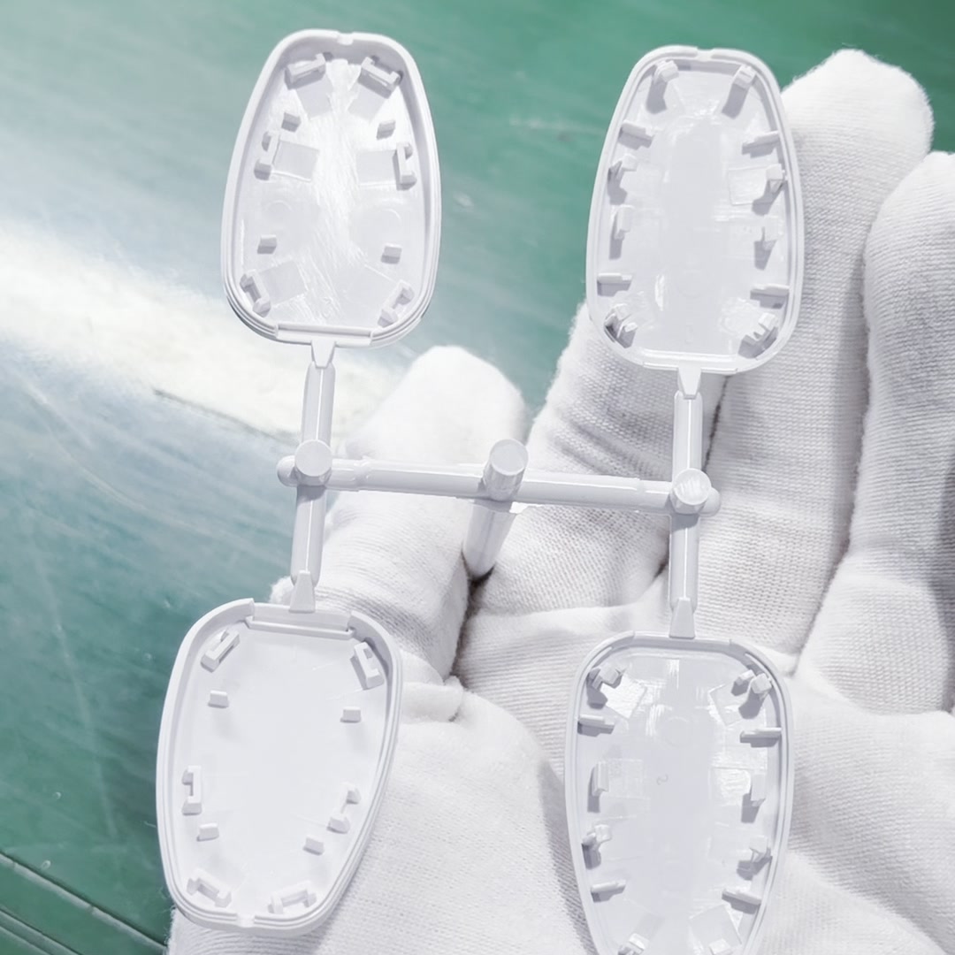 Transparent injection moulded components shown after moulding at JingZhan